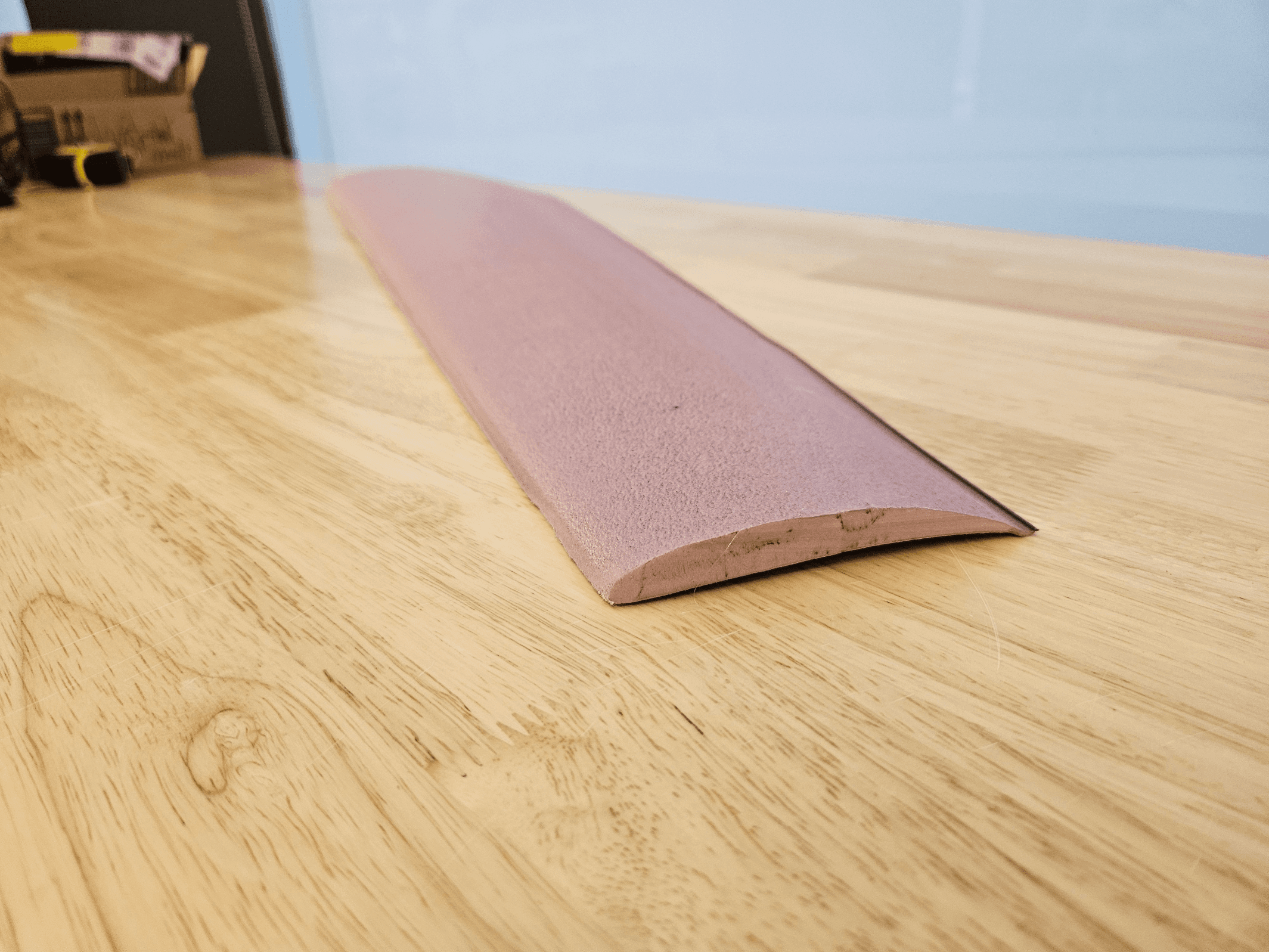 Wing-shaped foam cut on a table