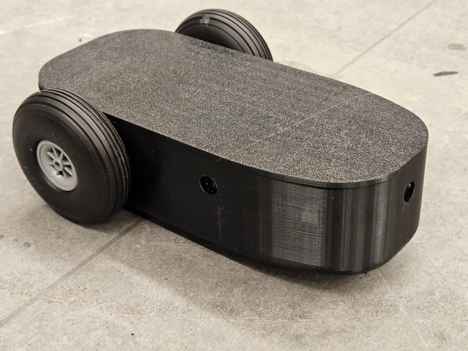 Payload chassis with wheels